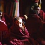 A monk is doing meditation at a lesson at Yachen monastery in Amdo